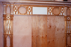 Before restoration Late 18th Century Gothic chimney piece.