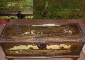 The piece was originally gilt on leather and then decorated. It was therefore quite time-consuming to restore but worth it. Hunting Scene Chest
