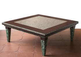 Custom built and decorated coffee table. Show simulated porphyry on the frieze and base